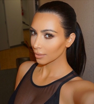 Ким Кардашьян хвастается успехами мужа Канье Уэста