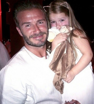 Дэвид Бекхэм с дочерью