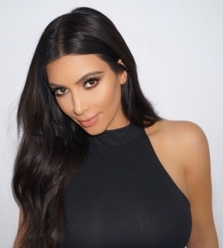 Ким Кардашьян в восторге от своей новой фотосессии для Glamour