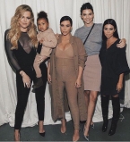 Семейная поддержка: сестры Кардашьян и и малышка Норт на показе Канье Уэста