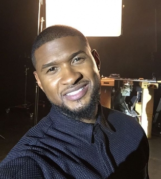 Без лишних глаз: R&amp;B-музыкант Ашер тайно женился