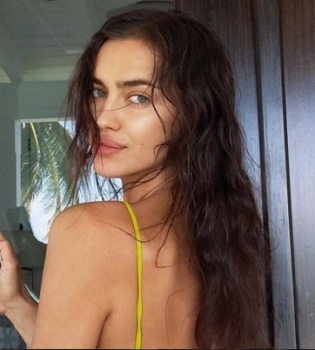 Ирина Шейк отправилась на рыбалку с незнакомыми мужчинами