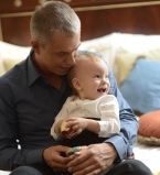 Андрей Доманский с ребенком