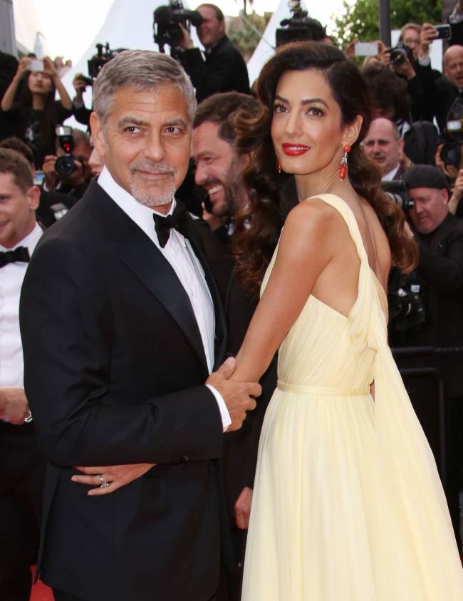 Влюбленные в Каннах: Джордж и Амаль Клуни демонстрируют нежные чувства на красной дорожке