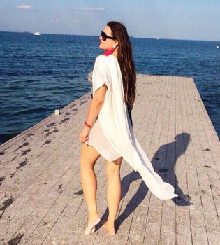 Наталья Могилевская на пляже