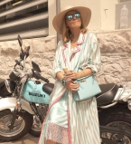 Ксения Собчак интригует поклонников снимками с округлившимся животиком