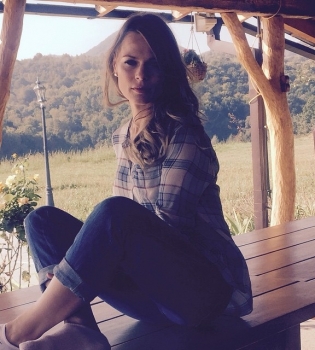 Ольга Фреймут после рождения сына усердно занимается в зале