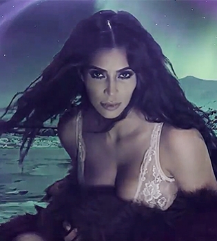 В нижнем белье и шубе: Ким Кардашьян снялась в ролике журнала Love