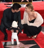 Бехати Принслу и Адам Ливайн впервые появились на публике с 4-месячной дочерью