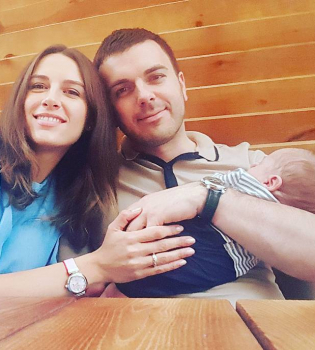 Григорий Решетник и его жена покрестили новорожденного сына