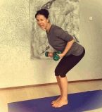 Маша Ефросинина с гантелями