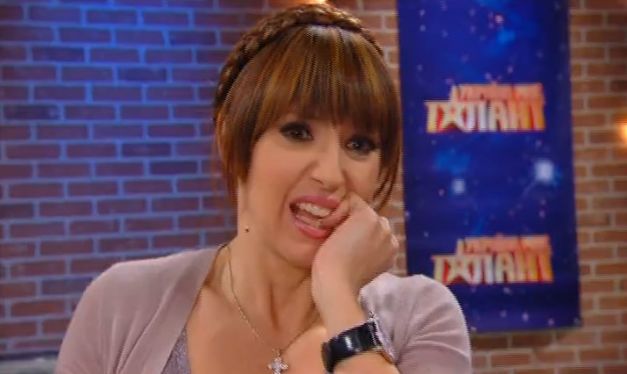 Оксана Марченко прическа коса как у Юлии Тимошенко фото 2014