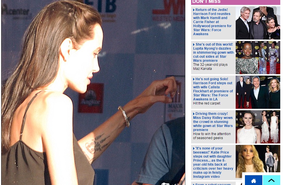 Фотофакт: Анджелина Джоли сделала новую таинственную татуировку